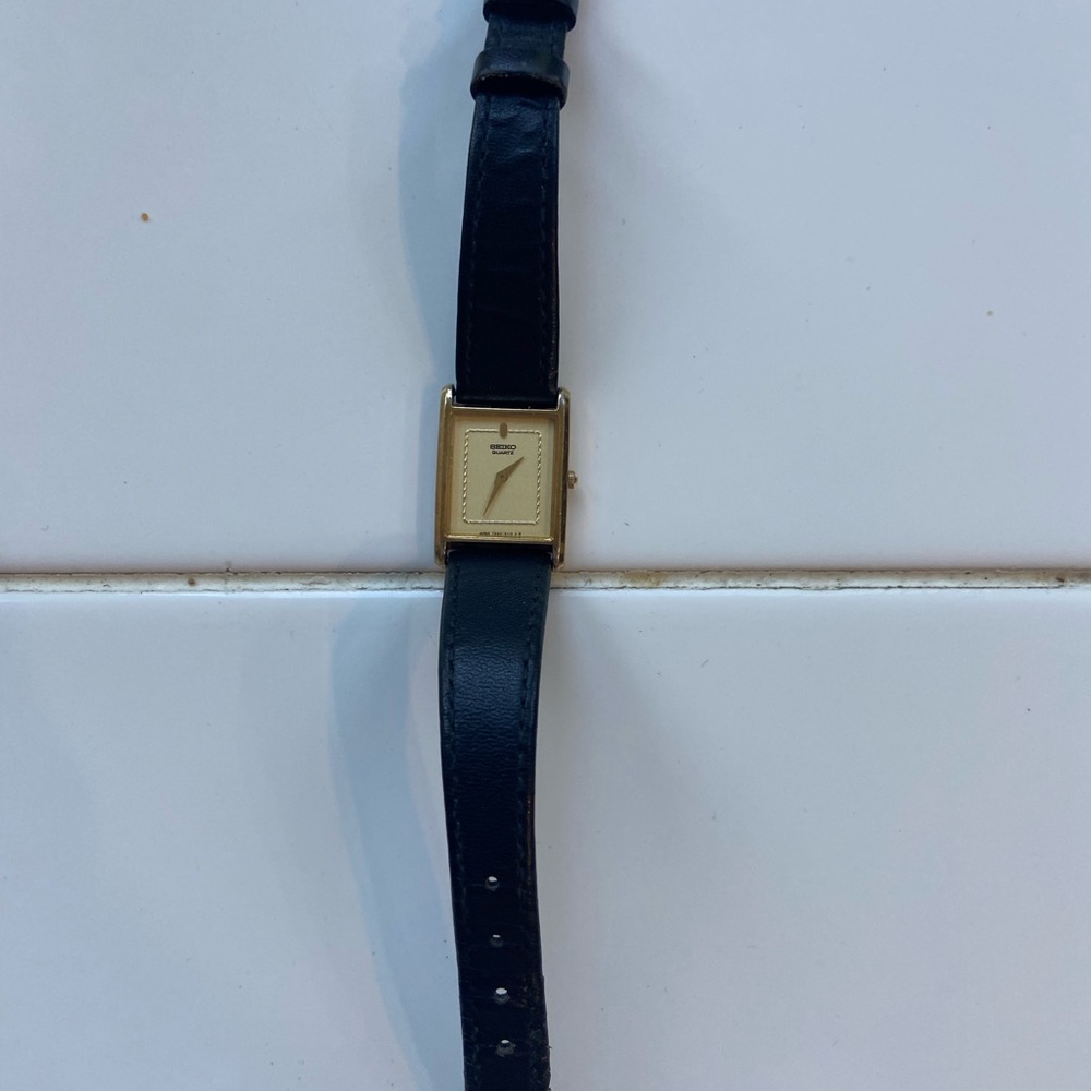 Classic woman’s Black Leather Dress Watch with Gold Case NEEDS BATTERY